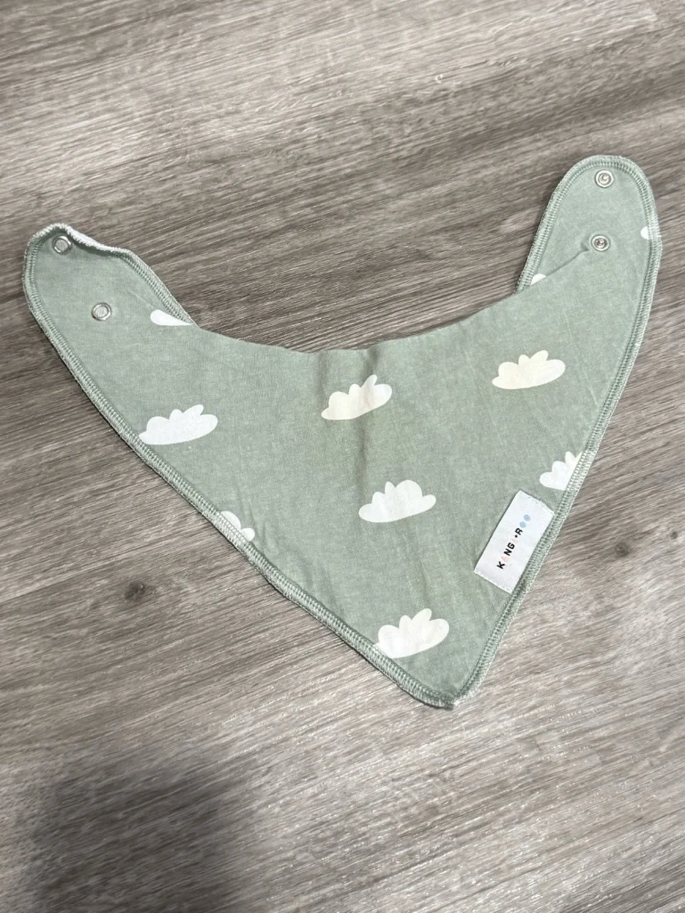 kangaROOS Sage Green Bandana Bib with White Cloud Motif